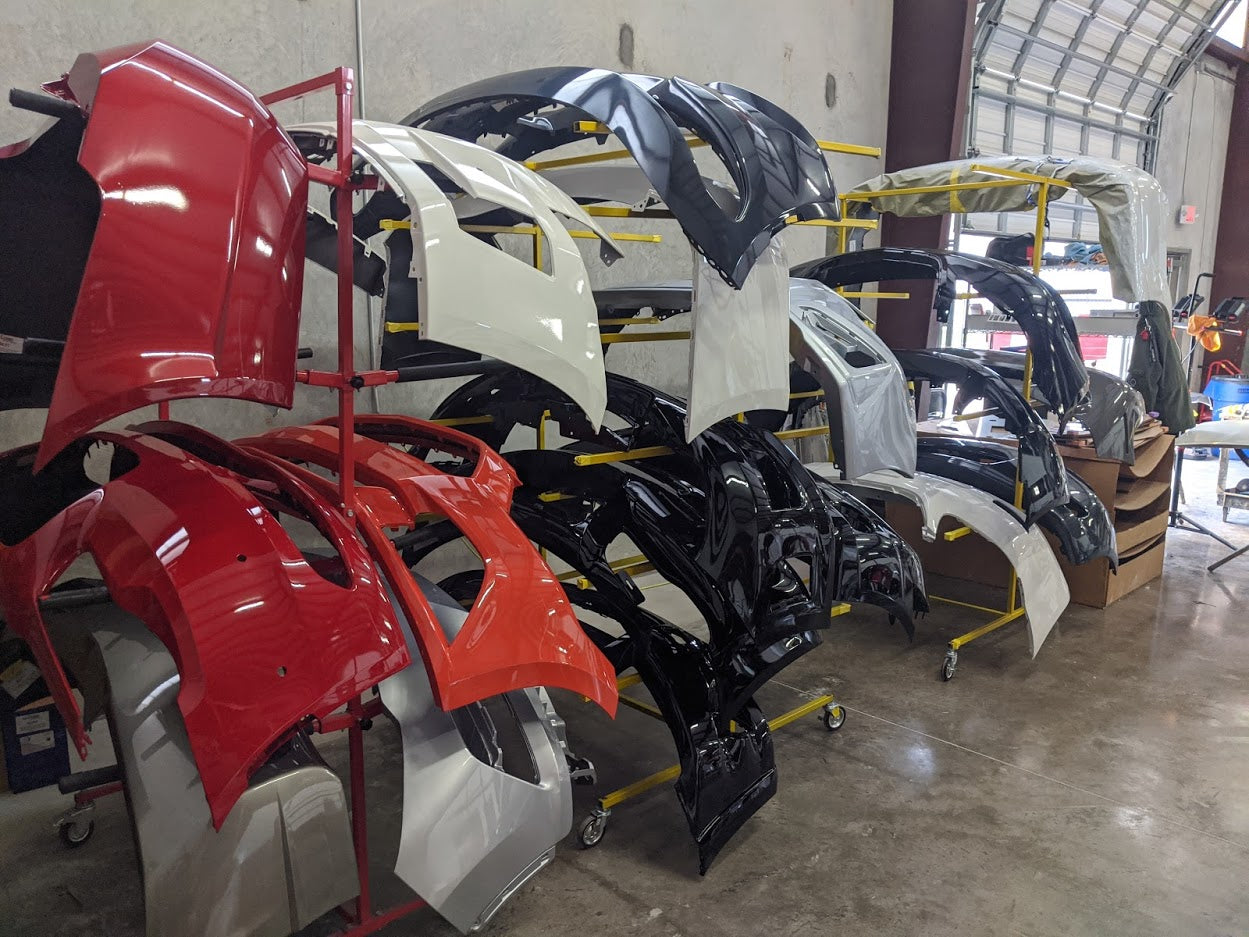 Perfect Replacement Painted Car Parts - ReveMoto Painted Auto Body Parts - Warehouse Photo With Painted Bumpers Ready To Be Shipped To Customers